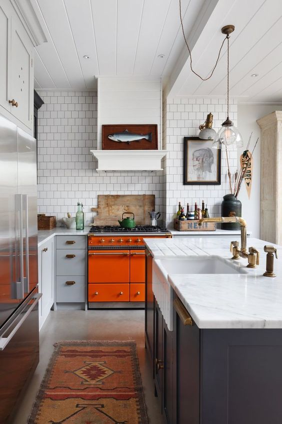 bright orange stove Our Favorite Kitchen Trends of 2019