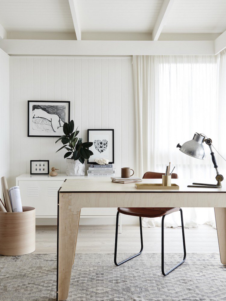 plywood desk in this white home office Home Office: How To Create A Scandinavian Feeling