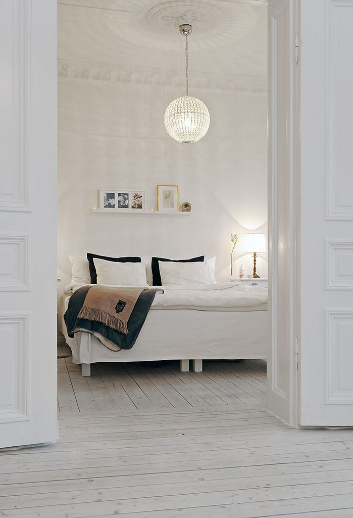 beautiful white bedroom 699x1024 9 Things to Put In Your Bedroom