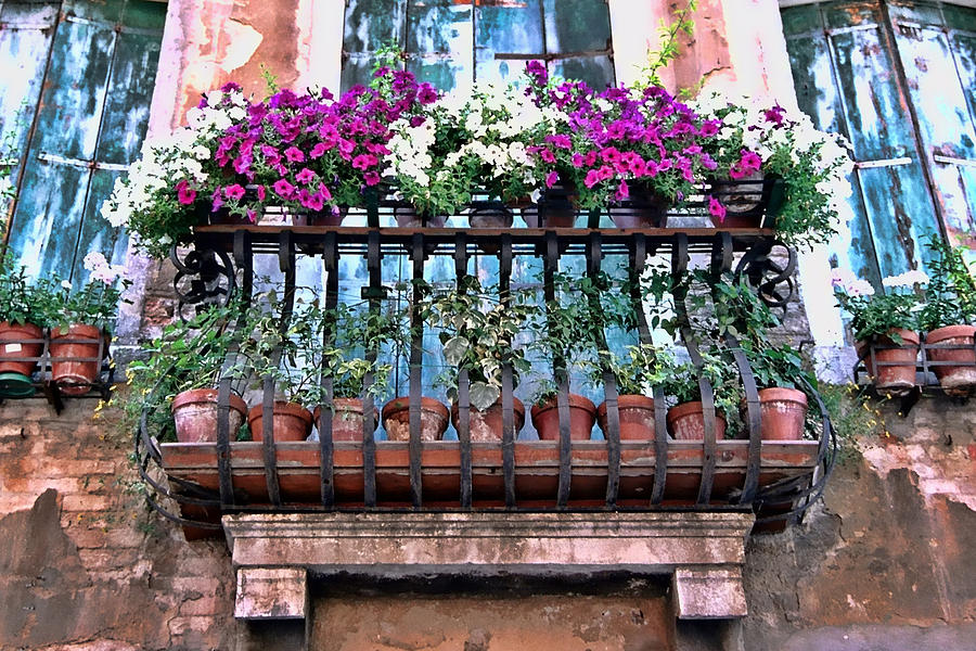 flowers on a balcony 35 Worlds Most Beautiful Balconies