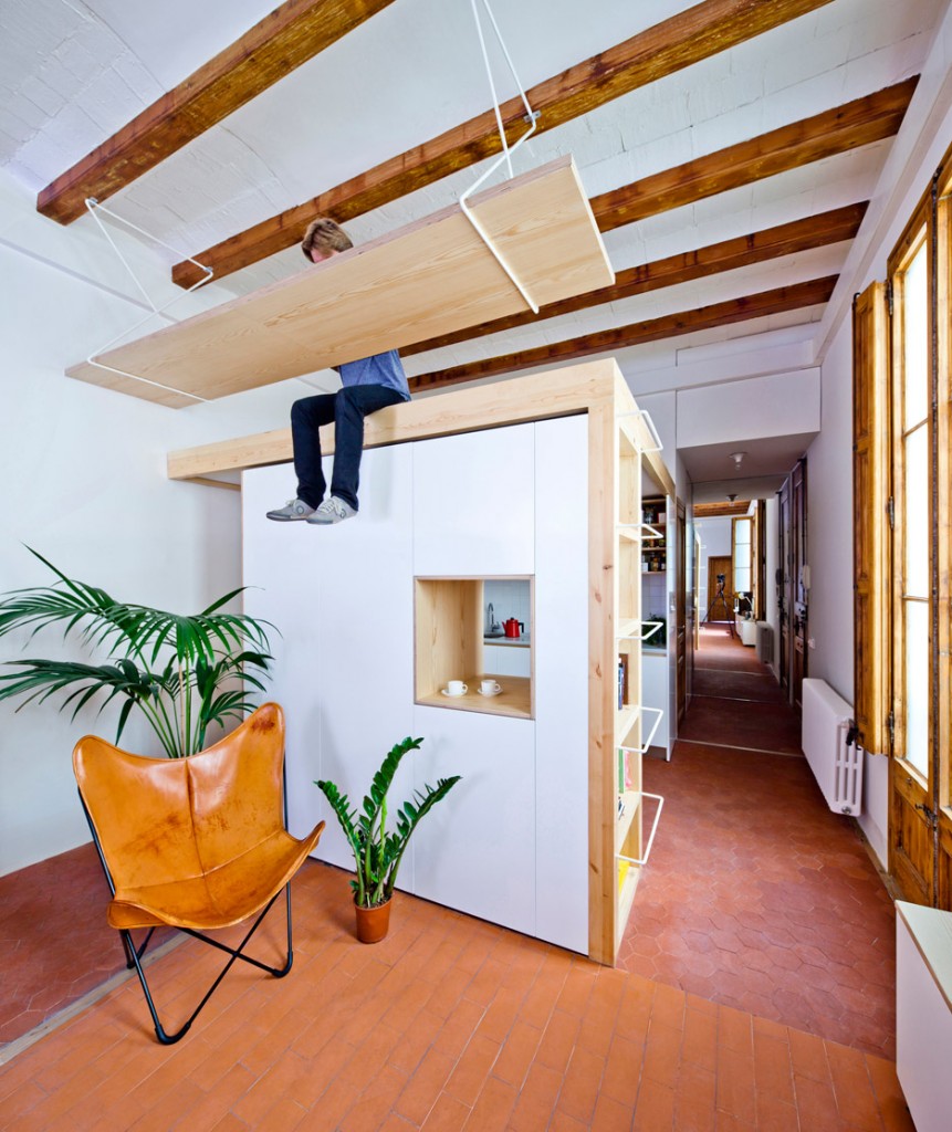 wooden desk is hanging from the ceiling in this apartment in barcelona 0 861x1024 Wooden Desk is Hanging From the Ceiling in this Apartment In Barcelona