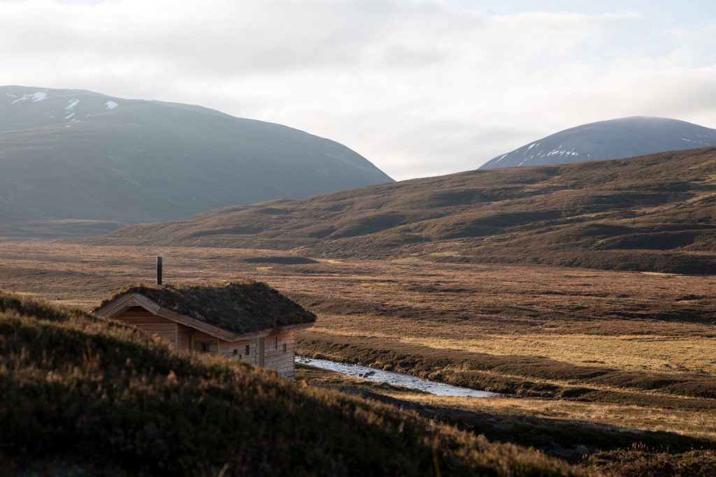 Dreamy Cabin in Mountainous Scottish Landscape by Moxon Architects
