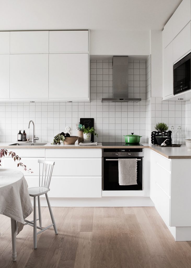 white tiles 731x1024 5 Cheap and Easy Ways to Improve Your Kitchen