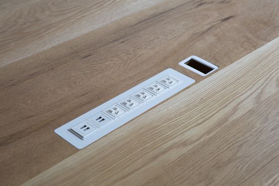 power outlets in a table How To Create A More Productive Home Office Environment
