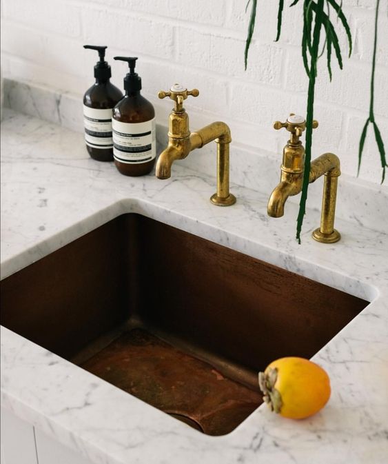 Copper sink and marble countertop