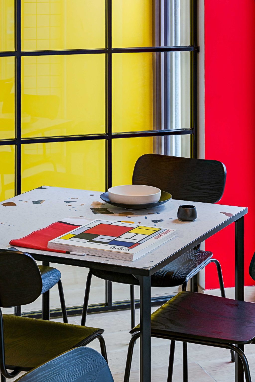 Bauhaus and Piet Mondrian inspired restaurant interior in Vilnius