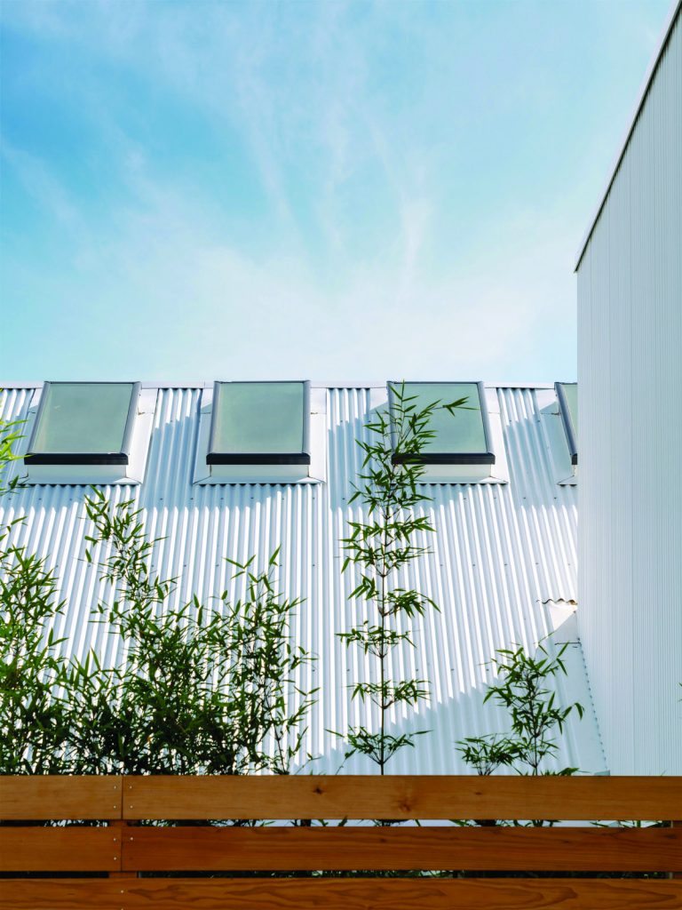 Corrugated white siding roof