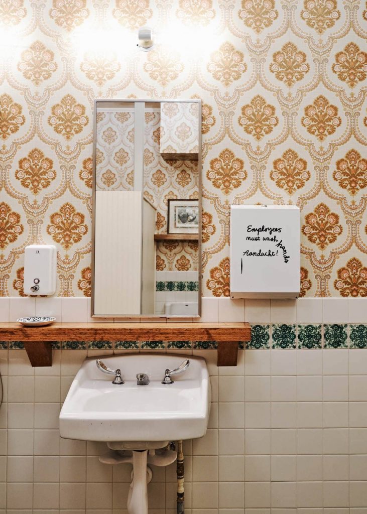 antique belgian wallpaper in a bathroom 731x1024 Craft Brewery Built in a Century old Brick Building