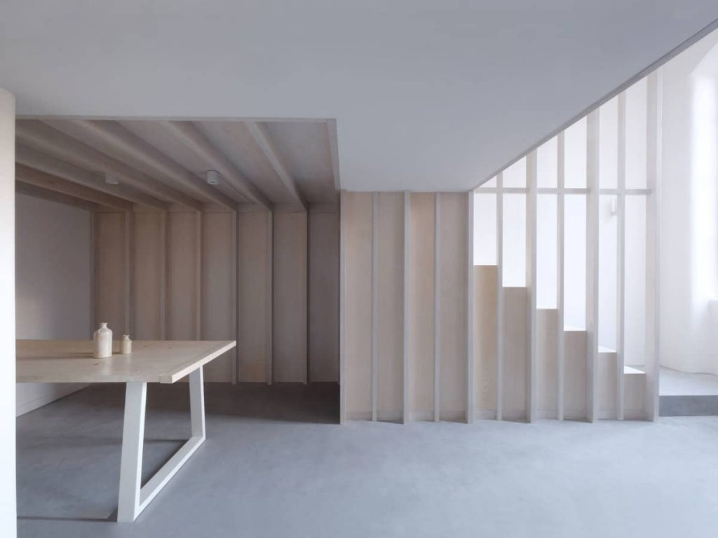 dining space and stairs 1024x768 A Converted Matchstick Factory Becomes a Beautiful Apartment