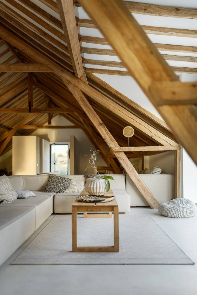 exposed wooden beams 684x1024 Enter Arquitectura Converts an Old Warehouse Into a Family Home