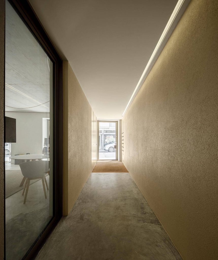 spacious corridor 859x1024 Miguel Bombarda Residential Building by Paula Santos Arquitectura