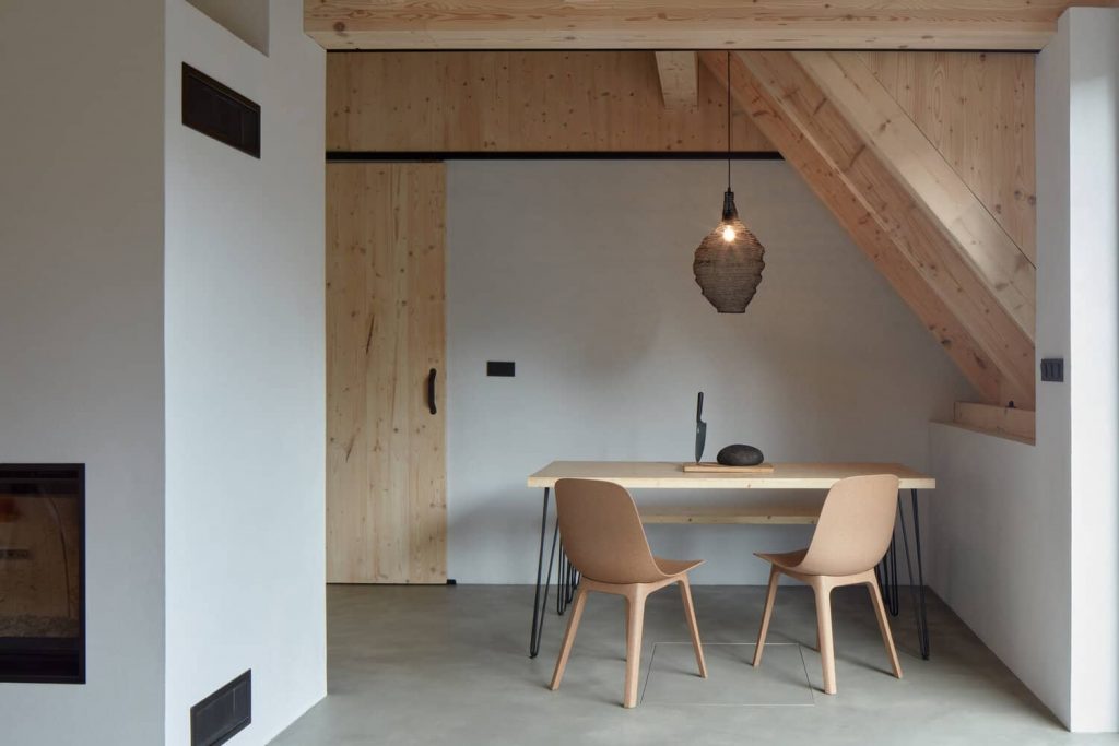 dining table 1 1024x683 A Cozy Cottage in the Woods by MjöLK Architects