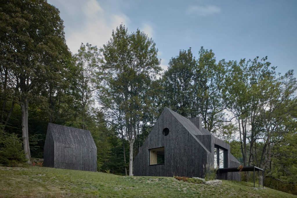 A Cozy Cottage in the Woods by MjöLK Architects