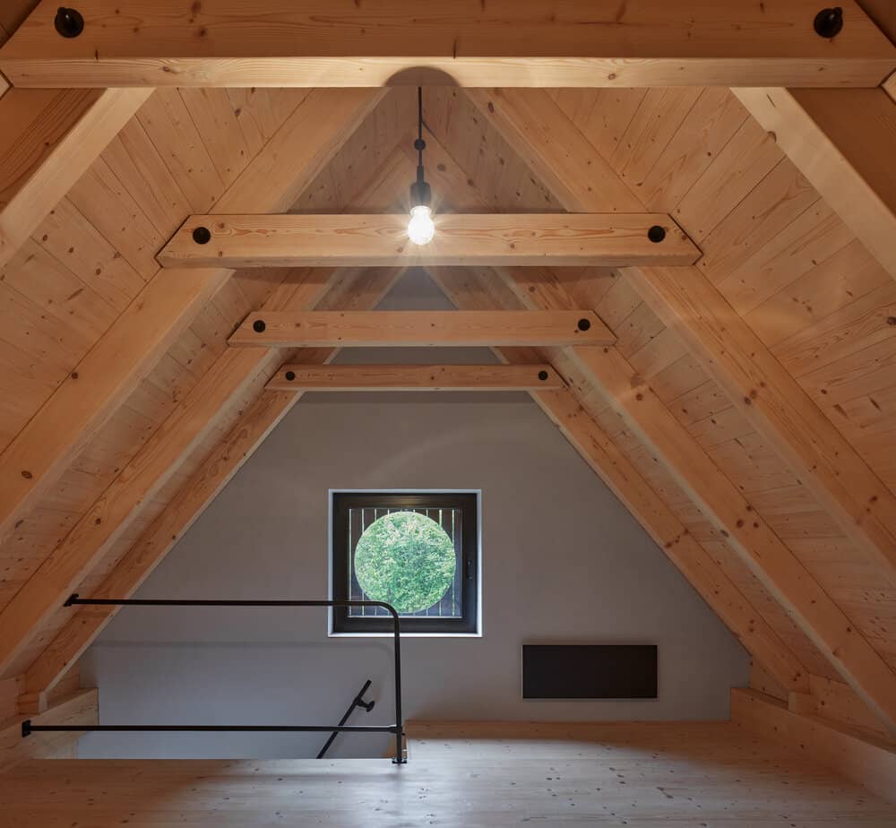 the view from the bed A Cozy Cottage in the Woods by MjöLK Architects