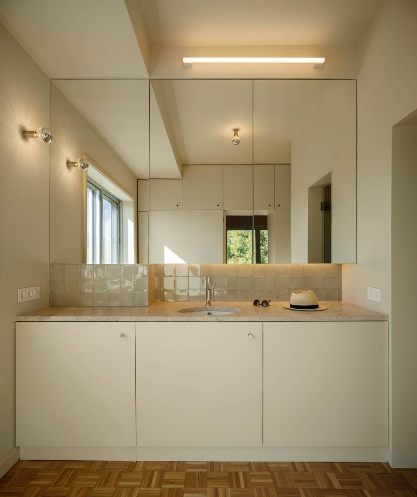 bathroom vanity 860x1024 Subtle Apartment Renovation by Costa Lima Arquitectos