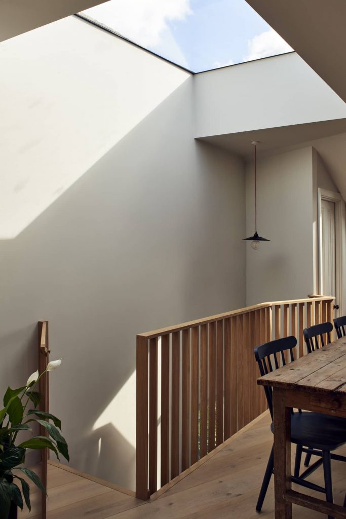 dining table and skylight 683x1024 Loft Conversion and Roof Extension by Mitchell + Corti Architects