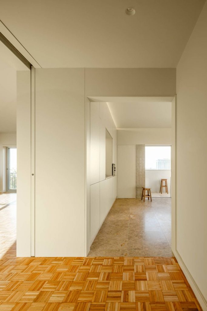 view to the kitchen 683x1024 Subtle Apartment Renovation by Costa Lima Arquitectos