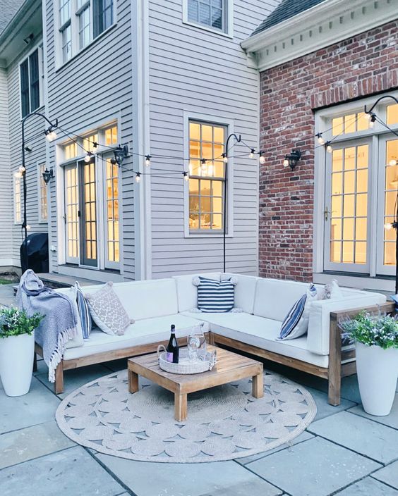 simple patio lighting solution 14 Patio Wall Ideas That Will Make Your Outdoor Space More Attractive