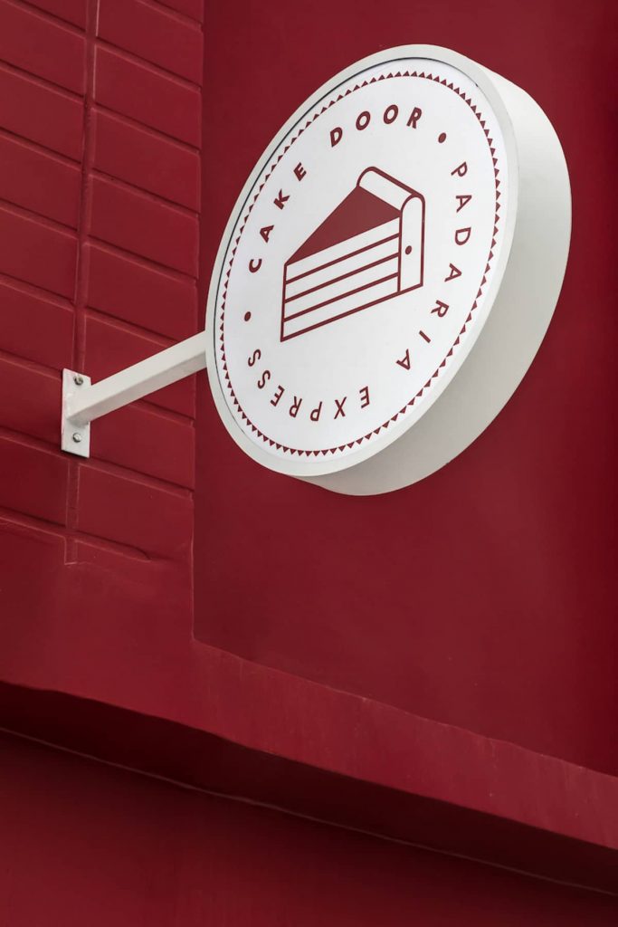 bakery signboard 683x1024 Cake Door   a Corner Bakery by BOSCARDIN CORSI Architects