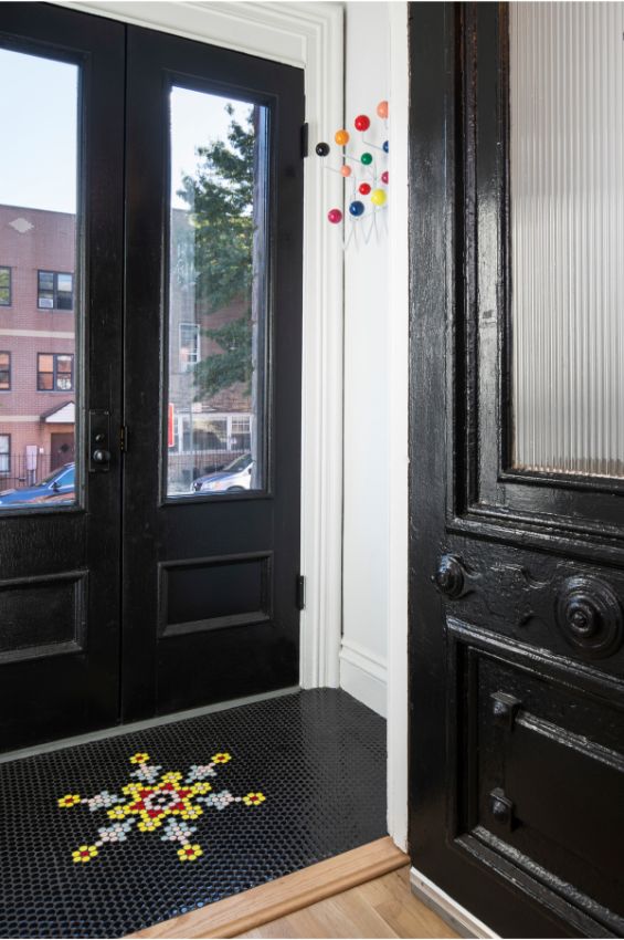 entry foyer 100 Year Old Townhouse Renovation by Studio Officina Architecture