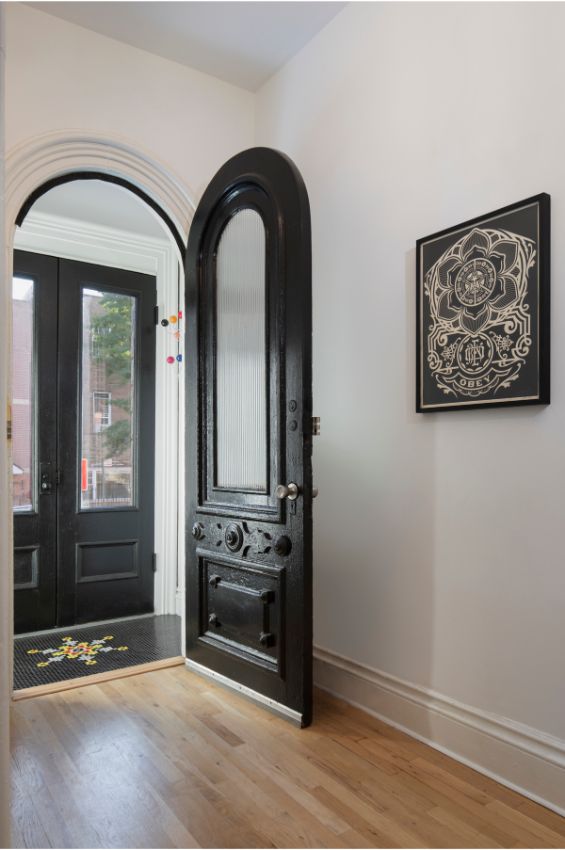 entry hallway 100 Year Old Townhouse Renovation by Studio Officina Architecture