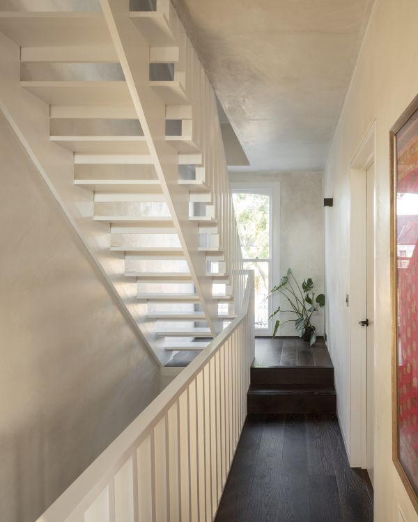 first floor landing Unagru Architects Transformed a Traditional Terrace Into a Bright Home