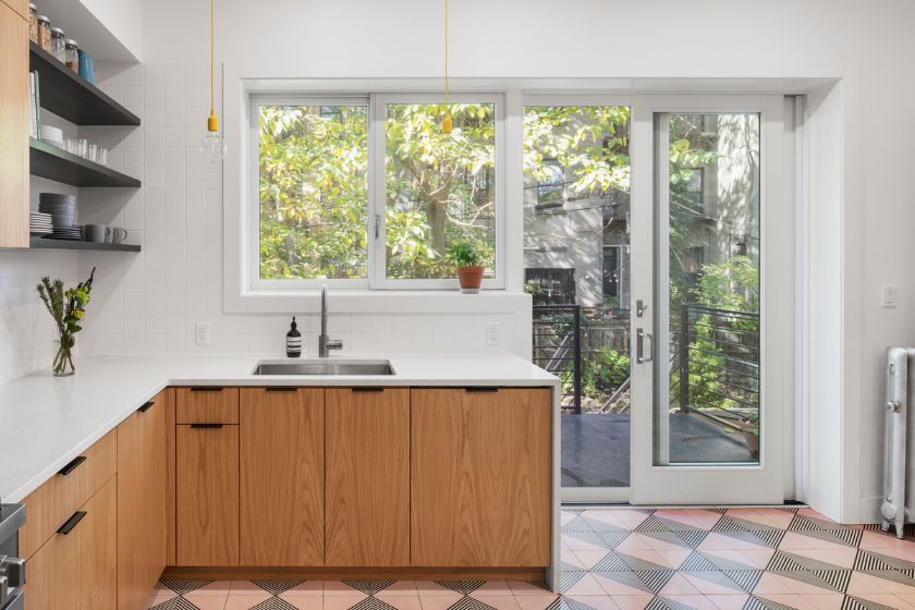 looking out to new deck 100 Year Old Townhouse Renovation by Studio Officina Architecture