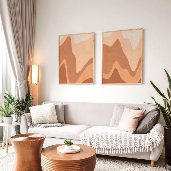 earth tone abstract calming wall art 16 Design Tips to Make Your Living Room More Cozy