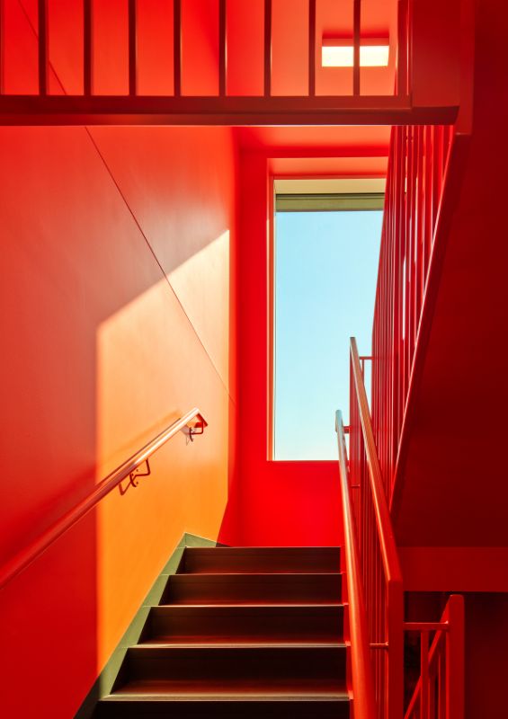 light and color wick students up the stairs UBCO Skeena Residence by PUBLIC Architecture Studio