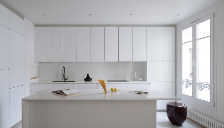 open plan kitchen Name Architecture Refurbished Two Parisian Apartments to Create a Unique Family Dwelling