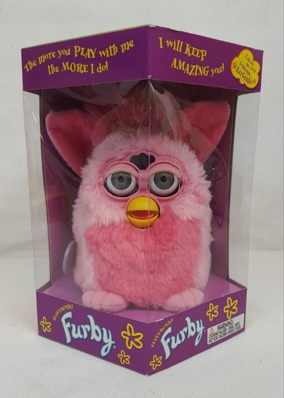 vintage 1999 tiger electronics furby flamingo pink 20 Things Worth Money in Your Home That You Can Sell Right Now