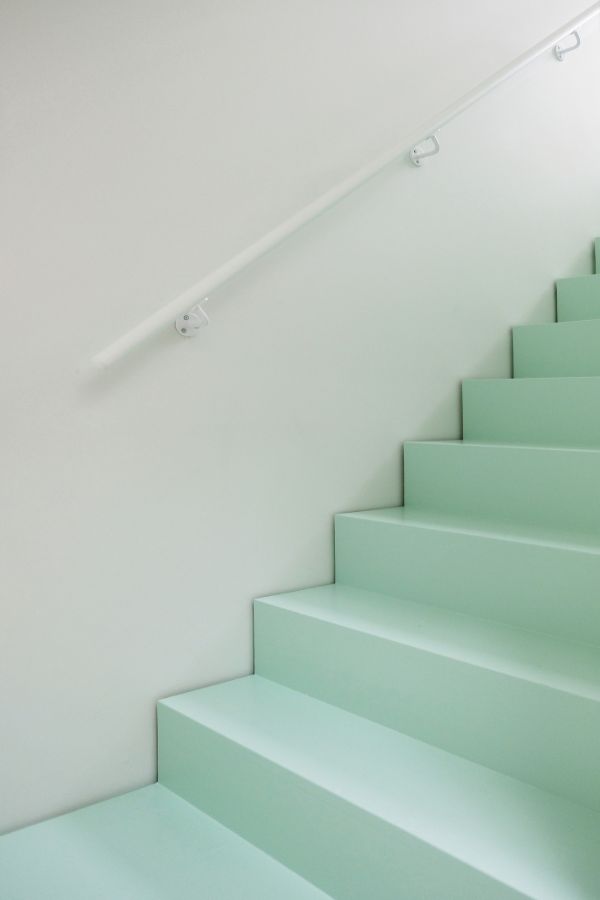 mint green stair 95 Mackay Laneway House by Gabriel Fain Architects