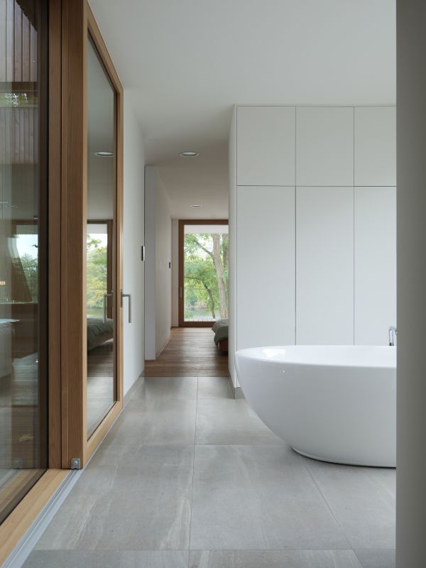 open plan bathroom Haus am See by Carlos Zwick