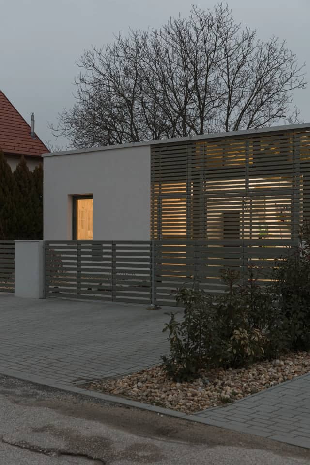 wooden slat facade Semi Detached House by Adam Balog