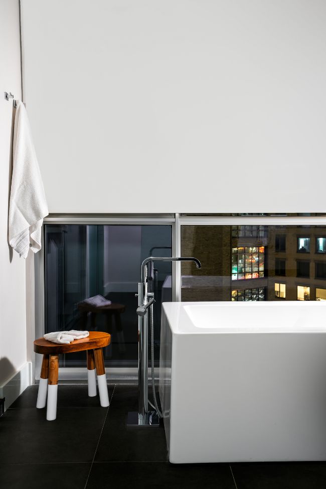 bathtub A Modern and Stylish Apartment by PROJECT AZ