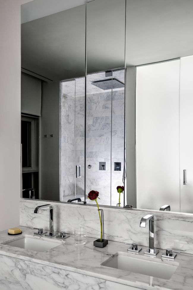 master bathroom A Modern and Stylish Apartment by PROJECT AZ