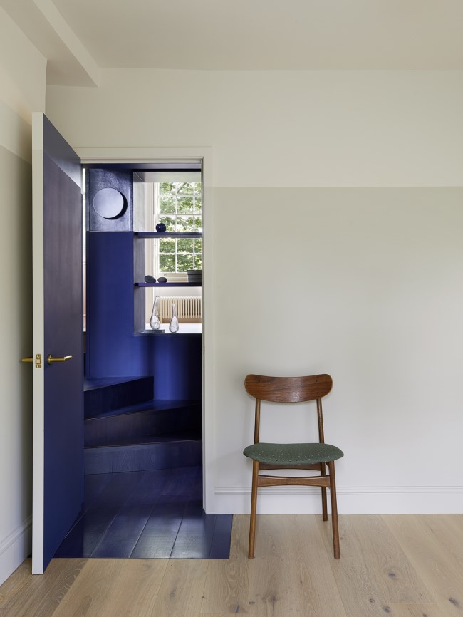 bedroom view to the staircase Highbury Fields Apartment by Patalab Architects