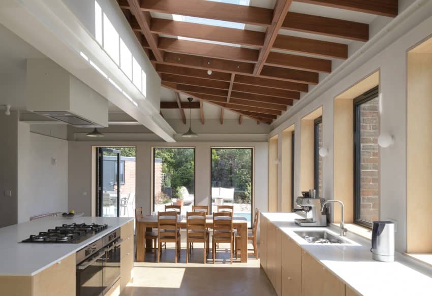 the kitchen and dining area A Complete Renovation and Extension of a 1960’s House by CAIRN