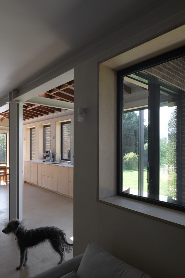 the view from the lowered reading area A Complete Renovation and Extension of a 1960’s House by CAIRN