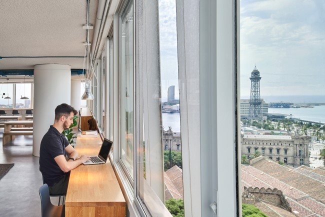 views through office windows A Coworking Space With Sea Views Designed by Elastiko