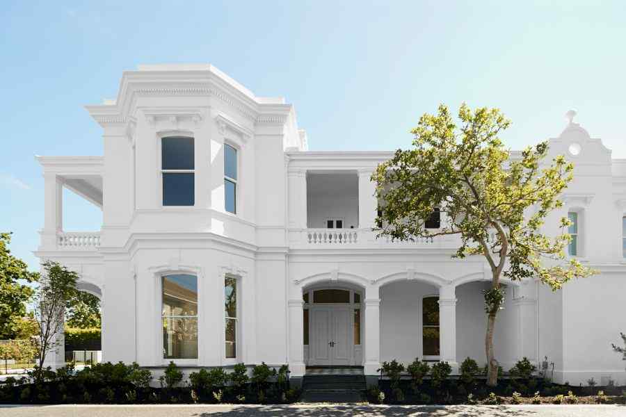 facade with entrance 19th Century Victorian Italianate Home Restoration by Embrace Architects