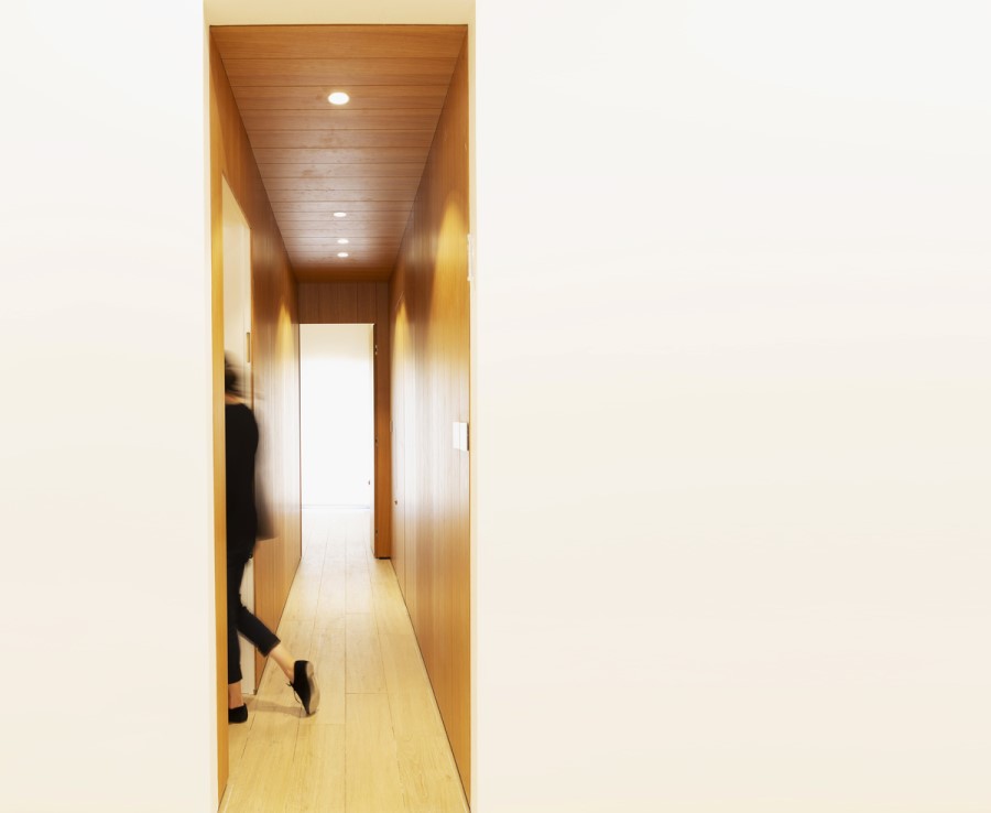 wooden corridor A Luxury Minimalist House by Ollech + Tol