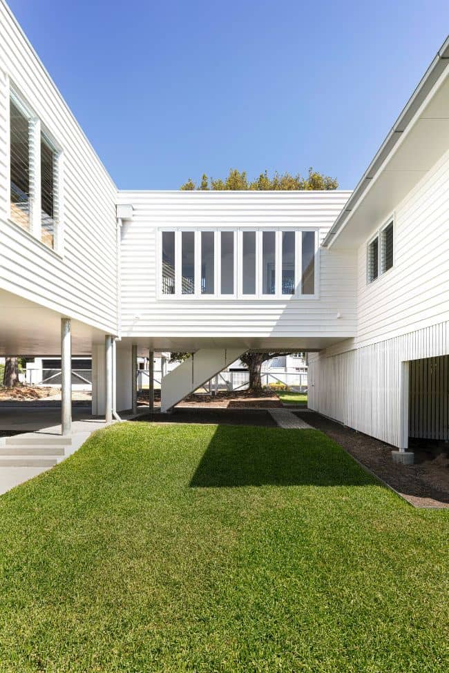 A Walkway Between Post-war Structure and Contemporary Extension by Wrightson Stewart