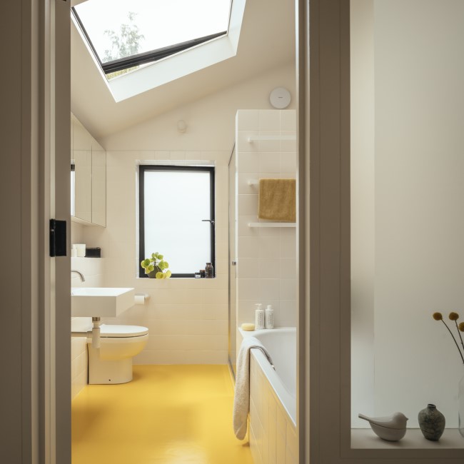new bathroom Whittaker Parsons Added Interlocking Extensions to a Terraced Townhouse