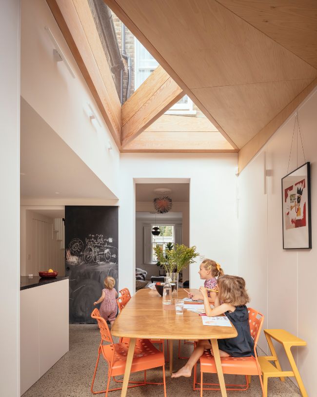 panelled dining space Whittaker Parsons Added Interlocking Extensions to a Terraced Townhouse