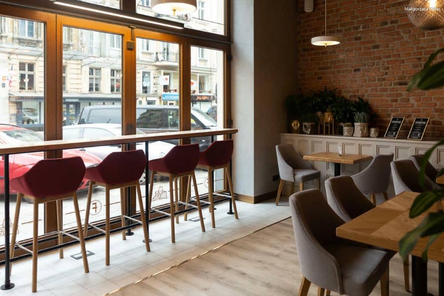 view to the street A Cheese Inspired Restaurant in Poznań by 370studio