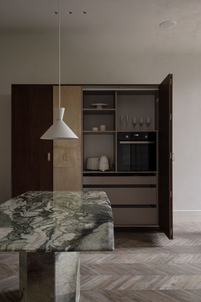 refrigerator and oven cabinet A Renovation of a Historical Apartment in Kyiv by Rina Lovko and Daryna Shpuryk