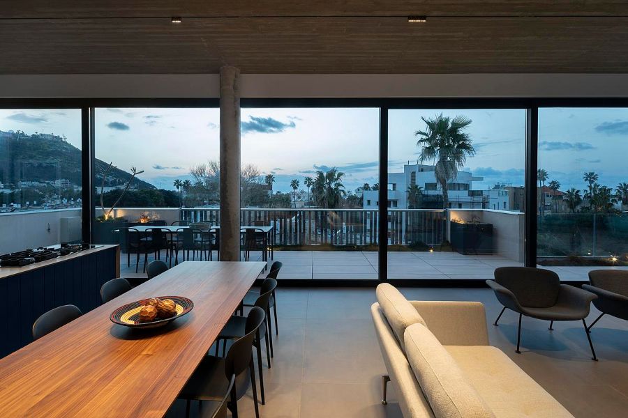 a view from the dining table Bet Galim Duplex by Erez Shani Architecture