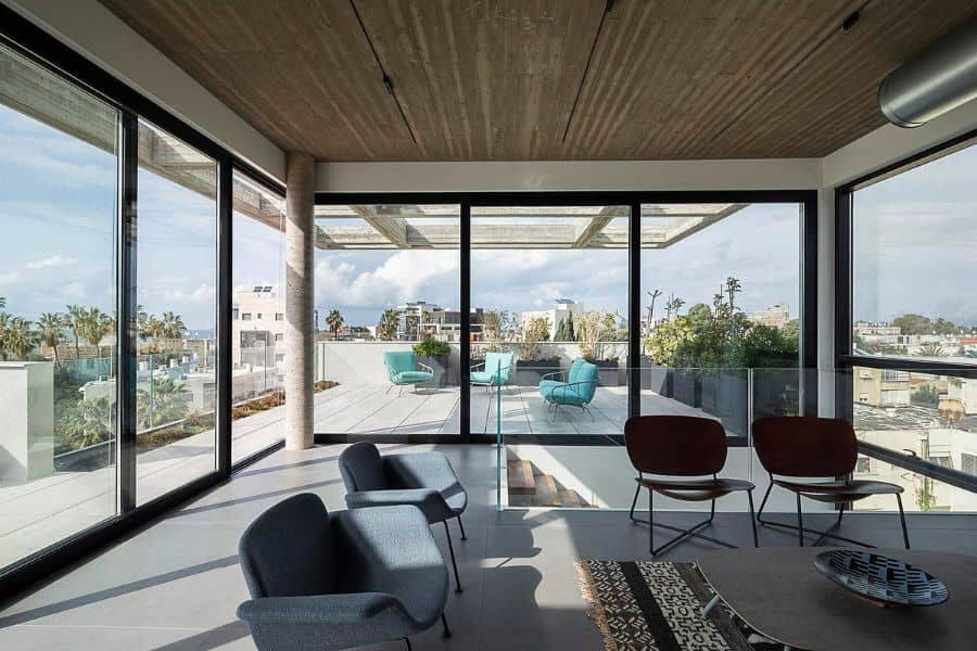 floor to ceiling windows Bet Galim Duplex by Erez Shani Architecture