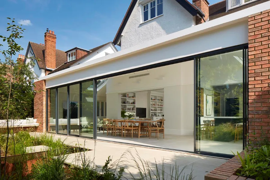 Large sliding doors open to the garden